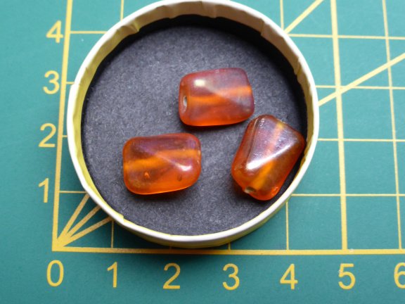 Nr. 555, oranje glaskralen - nr. 1