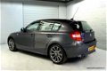 BMW 1-serie - 130i Sportinterieur Leder Navig Dealer 130 - 1 - Thumbnail