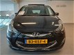 Hyundai ix20 - 1.4i i-Catcher, NAVI, Panoramadak, Leder, Climate Control - 1 - Thumbnail