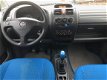 Opel Agila - 1.2 I 16V (APK TOT 21-12-2020) - 1 - Thumbnail