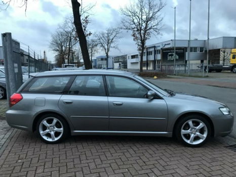 Subaru Legacy Touring Wagon - 2.0R AWD Airco/ECC, Cruisecontrol - 1