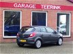 Opel Corsa - 1.4-16V Cosmo 101PK 5-drs, clima, cruise, pdc, elektr.ramen, trekhaak RIJKLAAR - 1 - Thumbnail