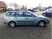 Ford Focus Wagon - 1.4-16V Ambiente - 1 - Thumbnail