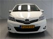 Toyota Yaris - 1.3 VVT-i Aspiration Navi | Airco | Camera | Lm velgen | Cruise - 1 - Thumbnail