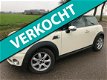 Mini Mini Cooper - 1.6 pepper / clima bj 2007 met 130.000 km - 1 - Thumbnail