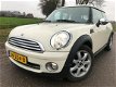 Mini Mini Cooper - 1.6 pepper / clima bj 2007 met 130.000 km - 1 - Thumbnail