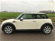 Mini Mini Cooper - 1.6 pepper / clima bj 2007 met 130.000 km - 1 - Thumbnail