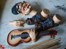 Plantenfiguren voor binnen en buiten Man met gitaar