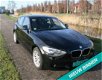 BMW 1-serie - 114i - zeer nette auto met airco - 1 - Thumbnail