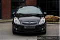 Opel Corsa - 1.4-16V Enjoy 5DRS AIRCO CRUISE 93dkm NAP NW APK - 1 - Thumbnail