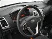 Hyundai i20 - 1.2i Business Edition / airco / 5 deurs / zwart-me tallic - 1 - Thumbnail