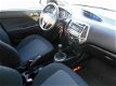 Hyundai i20 - 1.2I I-MOTION Airco | Carkit | Centrale deurvergrendeling | Trekhaak Staat in Hoogevee - 1 - Thumbnail