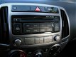 Hyundai i20 - 1.2I I-MOTION Airco | Carkit | Centrale deurvergrendeling | Trekhaak Staat in Hoogevee - 1 - Thumbnail