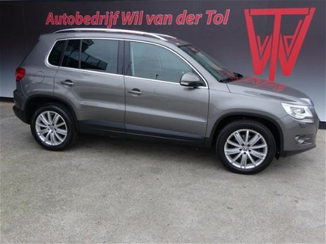 Volkswagen Tiguan - 1.4 TSI SPORT 4-MOTION | NAVIGATIE | LEER | XENON | TREKHAAK | ALL-IN - 1