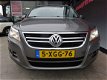 Volkswagen Tiguan - 1.4 TSI SPORT 4-MOTION | NAVIGATIE | LEER | XENON | TREKHAAK | ALL-IN - 1 - Thumbnail