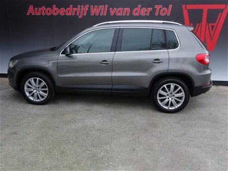 Volkswagen Tiguan - 1.4 TSI SPORT 4-MOTION | NAVIGATIE | LEER | XENON | TREKHAAK | ALL-IN - 1