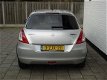 Suzuki Swift - 1.2 5drs exclusive clima/cruise/keyless gt body kit - 1 - Thumbnail