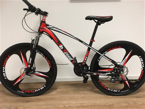 10 nieuwe Mountainbike's in doos - 1