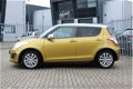 Suzuki Swift - 1.2 Exclusive EASSS Climate controle / Cruise controle / Navigatie - 1 - Thumbnail