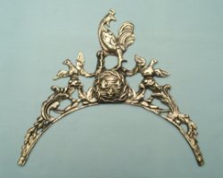 Messing gietstuk voor een 18de eeuwse Comtoise klok. Ø 24 cm. (Art.Nr. 101)