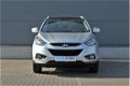 Hyundai ix35 - 1.7 CRDI BUSINESS Ed. | Panoramadak | Navigatie | Camera | Cruise & Climate Control | - 1 - Thumbnail