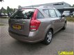 Kia Cee'd Sporty Wagon - 1.6 CRDi 115 X-tra - 1 - Thumbnail