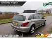 Mercedes-Benz R-klasse - 320 CDI Lang 4-Matic trekhaak leder stoelverwarming voor en achter 6 persoo - 1 - Thumbnail