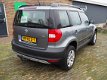 Skoda Yeti - 1.2 TSI Trekhaak Airco Koplampsproeiers Dakrails Lichtmetalen velgen Active Plus - 1 - Thumbnail