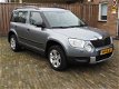 Skoda Yeti - 1.2 TSI Trekhaak Airco Koplampsproeiers Dakrails Lichtmetalen velgen Active Plus - 1 - Thumbnail