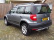 Skoda Yeti - 1.2 TSI Trekhaak Airco Koplampsproeiers Dakrails Lichtmetalen velgen Active Plus - 1 - Thumbnail