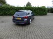 Opel Astra Sports Tourer - 1.4 Turbo Sport - 1 - Thumbnail