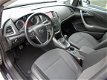 Opel Astra Sports Tourer - 1.4 Turbo 120pk Cosmo + Navigatie + Trekhaak + 17'' LMV - 1 - Thumbnail