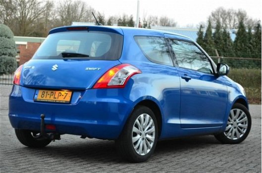 Suzuki Swift - 1.2 Exclusive / zeer netjes / Cruise / Clima - 1