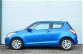 Suzuki Swift - 1.2 Exclusive / zeer netjes / Cruise / Clima - 1 - Thumbnail