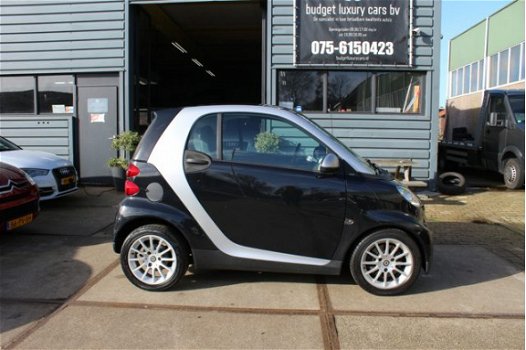 Smart Fortwo coupé - 1.0 mhd Pure Airco/15inch/71Pk/Pano - 1