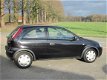 Opel Corsa - 1.2-16V Rhythm - 1 - Thumbnail