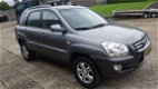 Kia Sportage - 2.0 CVVT Comfort - 1 - Thumbnail