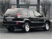 Toyota Land Cruiser - 4.0 V6 VVT-i Executive Leder, 8-persoons, Navi, Dak, 1e eigenaar, Bijtellingsv - 1 - Thumbnail