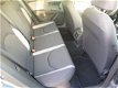 Seat Leon - ST 1.6 TDI Ecomotiv + Navigatie - LMV - 1 - Thumbnail