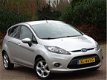 Ford Fiesta - 1.25 4-cyl Ghia 81PK+ 5-deurs / luxe pakket - 1 - Thumbnail