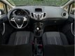 Ford Fiesta - 1.25 4-cyl Ghia 81PK+ 5-deurs / luxe pakket - 1 - Thumbnail