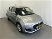 Suzuki Swift - 1.2 Comfort - 1 - Thumbnail