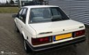 Mazda 323 - 1.5 LX SEDAN LPG VASTE EXPORTPRIJS € 750, - EX BTW - 1 - Thumbnail