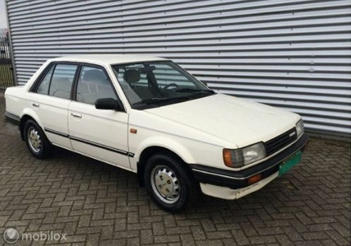 Mazda 323 - 1.5 LX SEDAN LPG VASTE EXPORTPRIJS € 750, - EX BTW - 1