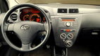 Daihatsu Cuore - 1.0 Premium AIRCO - 1 - Thumbnail