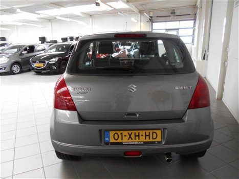 Suzuki Swift - 1.3 Exclusive - 1