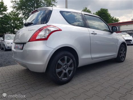 Suzuki Swift - IV 1.2 eindjaars actie - 1