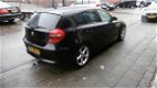 BMW 1-serie - 123d High Executive Automaat/Apk/Airco/Cruise/Navi/Xenon/Apk/Sensoren/Boekjes/Nap/Cd/E - 1 - Thumbnail