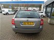 Skoda Octavia Combi - 1.6 FSI Tour AIRCO CRUISE CONTROL Financiering vanaf € 134, 00 per maand - 1 - Thumbnail