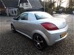 Opel Tigra TwinTop - 1.4-16V Linea Rosso nederlandse auto geen import - 1 - Thumbnail